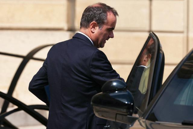 France's Prime Minister Sebastien Lecornu leaves after the weekly cabinet meeting at the Elysee Palace in Paris on July 22, 2026. (Photo by Dimitar DILKOFF / AFP)