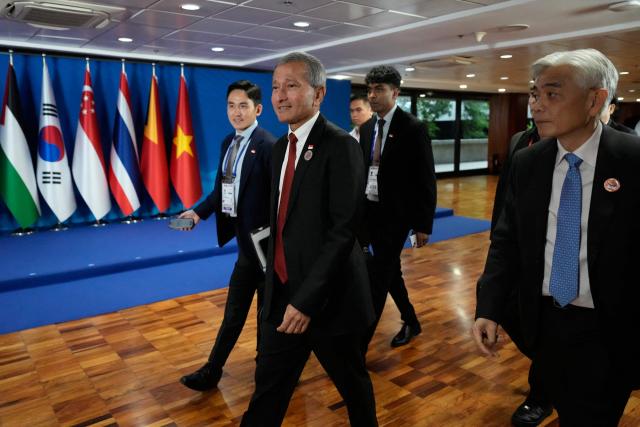 Singapore's Foreign Minister Vivian Balakrishnan (C) arrives for the Conference on Cooperation among East Asian Countries for Palestinian Development (CEAPAD), on the sidelines of the Association of Southeast Asian Nations (ASEAN) Foreign Ministers' Meeting in Pasay city, Metro Manila on July 22, 2026. (Photo by Aaron Favila / POOL / AFP)