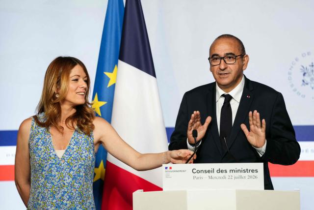 France's Government Spokesperson Maud Bregeon (L) and France's Interior Minister Laurent Nunez (R) speak during the press briefing at the end of the weekly cabinet meeting at the Elysee Palace in Paris on July 22, 2026. (Photo by Dimitar DILKOFF / AFP)