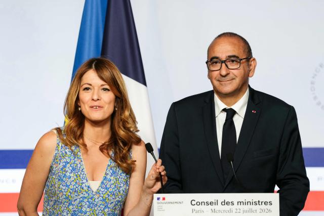 France's Government Spokesperson Maud Bregeon (L) and France's Interior Minister Laurent Nunez (R) speak during the press briefing at the end of the weekly cabinet meeting at the Elysee Palace in Paris on July 22, 2026. (Photo by Dimitar DILKOFF / AFP)