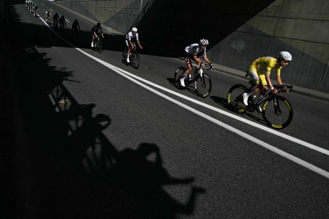 UAE Team Emirates - XRG's Slovenian rider Tadej Pogacar wearing the overall leader's yellow jersey cycles during the 17th stage of the 113th edition of the Tour de France cycling race, 174,7 km between Chambéry and Voiron in the French Alps, on July 22, 2026. (Photo by Jeff PACHOUD / AFP)