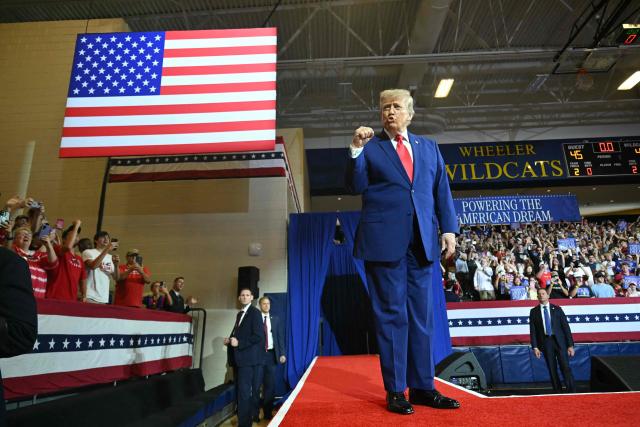 US President Donald Trump arrives to speak at Wheeler High School in Marietta, Georgia, on July 22, 2026. (Photo by SAUL LOEB / AFP)