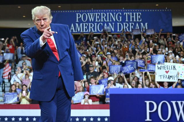 US President Donald Trump arrives to speak at Wheeler High School in Marietta, Georgia, on July 22, 2026. (Photo by SAUL LOEB / AFP)