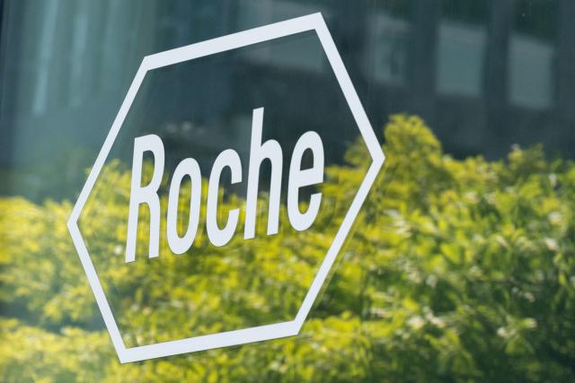 This photograph shows the logo of Roche, a Swiss multinational healthcare company operating in the pharmaceutical and diagnostics sectors, at its French office in Boulogne-Billancourt, outside Paris on July 22, 2026.  (Photo by Xavier GALIANA / AFP)