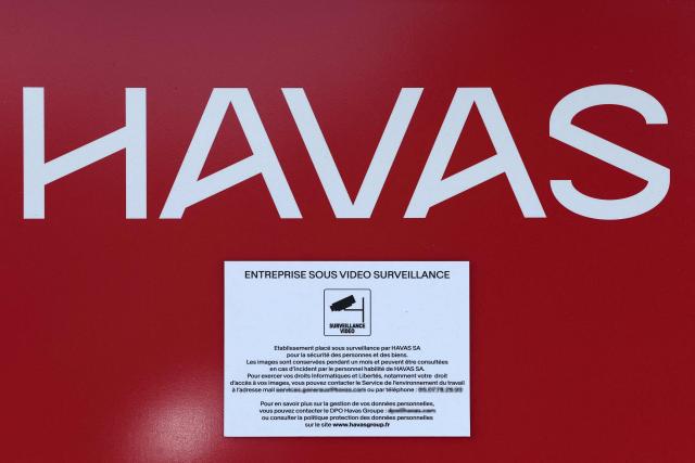 This photograph shows the logo of Havas, a French multinational advertising and public relations company, at its headquarters in Puteaux, outside Paris on July 22, 2026.  (Photo by Xavier GALIANA / AFP)