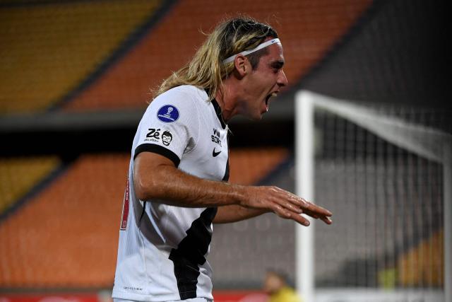 Vasco da Gama's Argentinian forward #77 Claudio Spinelli celebrates after scoring his team's second goal during the first leg of the Copa Sudamericana knockout round play-off football match between Colombia's Independiente Medellin and Brazil's Vasco da Gama, at the Atanasio Girardot stadium, in Medellin, Antioquia department, Colombia, on July 22, 2026. (Photo by Jaime SALDARRIAGA / AFP)