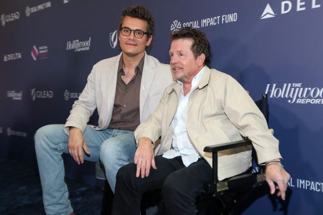 Canadian-US actor Michael J. Fox (R) and US singer/songwriter/guitarist John Mayer attend the third annual Social Impact Summit, hosted by The Hollywood Reporter and the Social Impact Fund, at the DGA Theatre in Los Angeles on July 22, 2026. (Photo by VALERIE MACON / AFP)