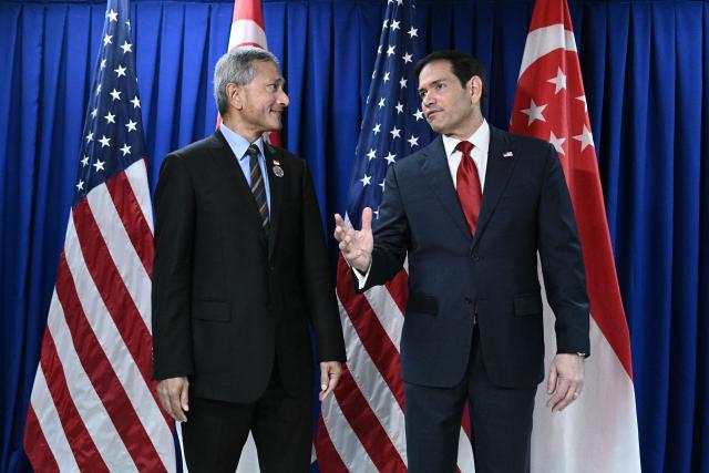 US Secretary of State Marco Rubio (R) meets with Singapore's Foreign Minister Vivian Balakrishnan on the sidelines of the Association of Southeast Asian Nations (ASEAN) Foreign Ministers Meeting in Pasay, Metro Manila on July 23, 2026. (Photo by Brendan SMIALOWSKI / POOL / AFP)