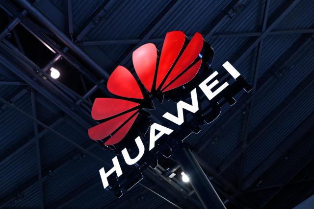 (FILES) A logo of Huawei is seen during the World Artificial Intelligence Conference (WAIC) in Shanghai on July 6, 2023. A perfect result at the world's most prestigious mathematics contest used to be the preserve of a handful of bright young minds each year, but for the first time, artificial intelligence has also scored full marks. (Photo by WANG Zhao / AFP)