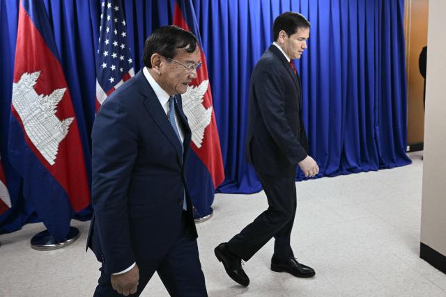 US Secretary of State Marco Rubio (R) meets with Cambodia's Deputy Prime Minister and Foreign Minister Prak Sokhonn on the sidelines of the Association of Southeast Asian Nations (ASEAN) Foreign Ministers Meeting in Pasay, Metro Manila on July 23, 2026. (Photo by Brendan SMIALOWSKI / POOL / AFP)