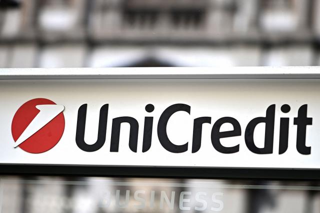 (FILES) This picture taken on March 18, 2023 shows the logo of Italian bank Unicredit in Milan. UniCredit on July 23, 2026 reported quarterly net profit of Ђ2.9 billion, down 13.1% year-on-year, a decline mainly attributable to exceptional items linked to its increased stake in Commerzbank. (Photo by GABRIEL BOUYS / AFP)