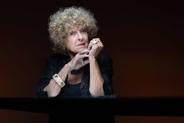 French author, biographer, and screenwriter Elisabeth Reynaud poses during a photo session  in Paris on July 21, 2026. (Photo by Joel Saget / AFP)