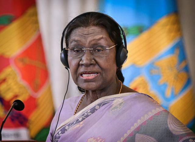 Indian President Droupadi Murmu addresses a joint press conference with Romania's President at the presidential Cotroceni Palace in Bucharest on July 23, 2026. Indian President Droupadi Murmu is on a three-day state visit to Romania. (Photo by Daniel MIHAILESCU / AFP)