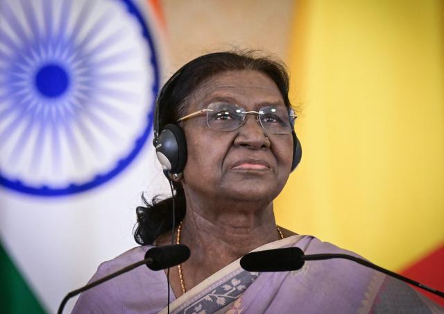 Indian President Droupadi Murmu looks on during a joint press conference with Romania's President at the presidential Cotroceni Palace in Bucharest on July 23, 2026. Indian President Droupadi Murmu is on a three-day state visit to Romania. (Photo by Daniel MIHAILESCU / AFP)