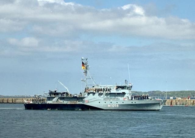 (FILES) The German navy's minehunter boat "Fulda" leaves the harbour of Kiel, northern Germany, on May 4, 2026, to set sail for the Mediterranean as part of a pre-deployment operation in preparation for a possible mission in the Strait of Hormuz. The German navy will move two vessels from the Red Sea region to the eastern Mediterannean "in the coming days", the defence ministry said in a statement on July 23, 2026. The "Fulda" minesweeper and the "Mosel" supply ship were currently in Djibouti, a ministry spokesman confirmed to AFP. They had been sent last month in preparation for a possible mission in the Strait of Hormuz after the end of the US-Iran war. However the ministry statement cited the "the volatile political situation... and the absence of any foreseeable near-term start of operations" in the Strait of Hormuz. (Photo by Sandra BECKEFELDT / AFP)