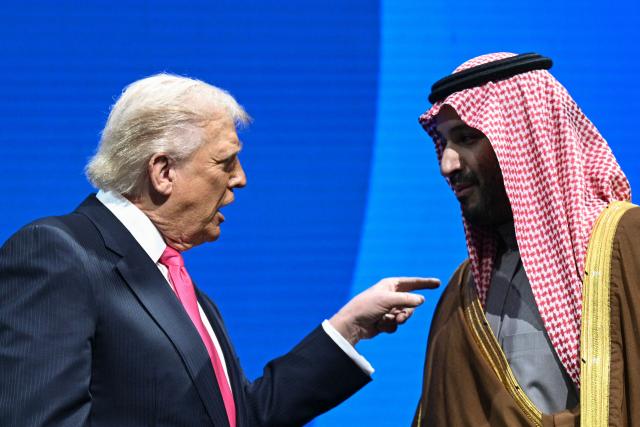 (FILES) Crown Prince and Prime Minister of the Kingdom of Saudi Arabia Mohammed bin Salman and US President Donald Trump speaks at the US-Saudi Investment Forum at the John F. Kennedy Center for the Performing Arts in Washington, DC on November 19, 2025. US President Donald Trump said on July 23, 2026, that a nuclear deal with Saudi Arabia depends on the kingdom recognizing Israel -- throwing the agreement into turmoil just the day after it was signed. Riyadh has long resisted joining the so-called Abraham Accords with Israel, insisting especially after the Gaza conflict on a pathway to a Palestinian state. (Photo by Brendan SMIALOWSKI / AFP)
