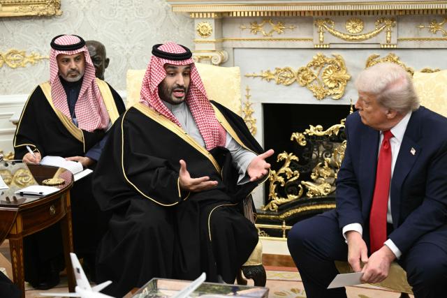 (FILES) Crown Prince and Prime Minister of the Kingdom of Saudi Arabia Mohammed bin Salman speaks during a meeting with US President Donald Trump in the Oval Office of the White House in Washington, DC on November 18, 2025. US President Donald Trump said on July 23, 2026, that a nuclear deal with Saudi Arabia depends on the kingdom recognizing Israel -- throwing the agreement into turmoil just the day after it was signed. Riyadh has long resisted joining the so-called Abraham Accords with Israel, insisting especially after the Gaza conflict on a pathway to a Palestinian state. (Photo by Brendan SMIALOWSKI / AFP)