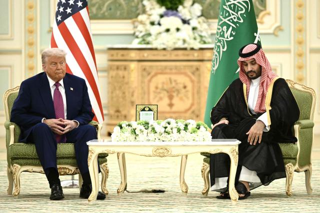 (FILES) US President Donald Trump and Saudi Crown Prince Mohammed bin Salman look on during a bilateral meeting in Riyadh on May 13, 2025. US President Donald Trump said on July 23, 2026, that a nuclear deal with Saudi Arabia depends on the kingdom recognizing Israel -- throwing the agreement into turmoil just the day after it was signed. Riyadh has long resisted joining the so-called Abraham Accords with Israel, insisting especially after the Gaza conflict on a pathway to a Palestinian state. (Photo by Brendan SMIALOWSKI / AFP)