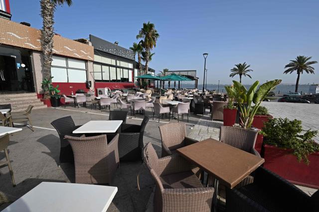 This photo shows view of a deserted cafe during heatwave in Tunis on July 23, 2026. In Tunisia long power outages across the country have added to the strain of an intense heatwave, with temperatures as high as 49C, leaving many fearing for their livelihoods. (Photo by FETHI BELAID / AFP)