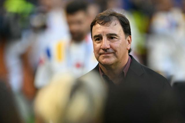 (FILES) Colombia's Argentine head coach Nestor Lorenzo looks on ahead of the 2026 World Cup Group K football match between Colombia and Portugal at the Miami Stadium in Miami Gardens on June 27, 2026. Argentine Nestor Lorenzo has extended his contract as head coach of the Colombian national football team, the Colombian Football Federation (FCF) announced on July 23, 2026. (Photo by CHANDAN KHANNA / AFP)