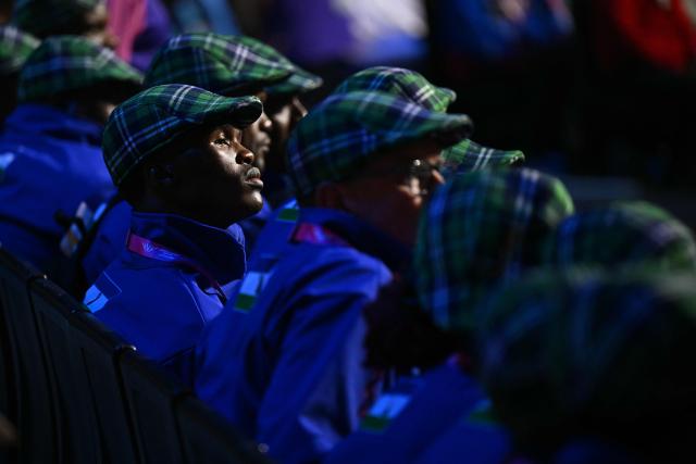 Athletes representing Lesotho watch the opening ceremony of the 23rd Commonwealth Games at the OVO Arena in Glasgow, Scotland, on July 23, 2026. (Photo by Oli SCARFF / AFP)
