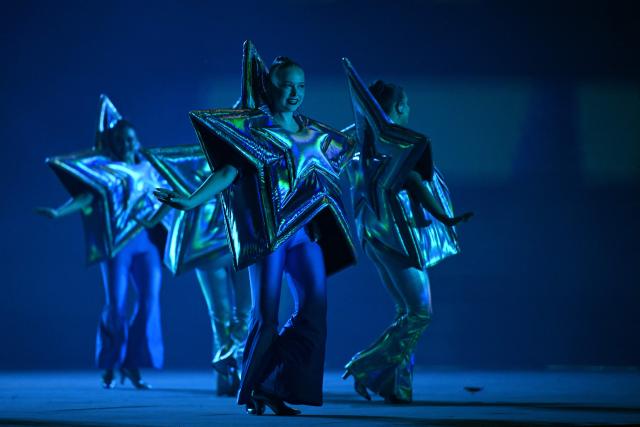 Dancers perform during the opening ceremony of the 23rd Commonwealth Games at the OVO Arena in Glasgow, Scotland, on July 23, 2026. (Photo by Oli SCARFF / AFP)