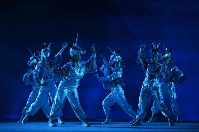 Dancers perform during the opening ceremony of the 23rd Commonwealth Games at the OVO Arena in Glasgow, Scotland, on July 23, 2026. (Photo by Oli SCARFF / AFP)