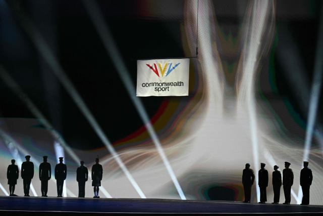 The commonwealth sport flag is raised during the opening ceremony of the 23rd Commonwealth Games at the OVO Arena in Glasgow, Scotland, on July 23, 2026. (Photo by Oli SCARFF / AFP)