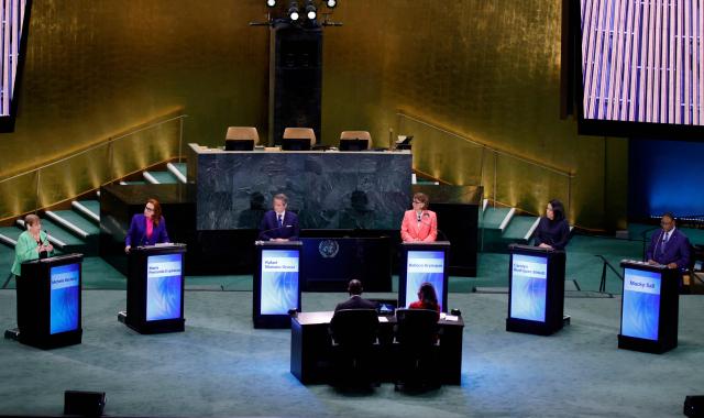 (L-R) Candidates for United Nations Secretary-General position, Chile’s former president Michelle Bachelet, Ecuadorean diplomat and former President of the UN General Assembly Maria Fernanda Espinosa, Argentine diplomat and Director General of the International Atomic Energy Agency (IAEA) Rafael Mariano Grossi, Costa Rican economist and Secretary-General of UNCTAD Rebeca Grynspan, Guyana’s former foreign minister Carolyn Rodrigues and Senegal’s former president Macky Sall participate in a debate at the UN General Assembly Hall in New York, on July 23, 2026.  (Photo by Leonardo MUNOZ / AFP)