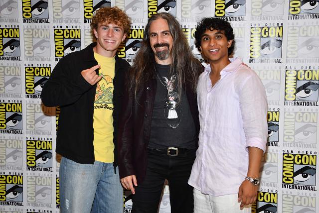 US actors Walker Scobell (L) and Aryan Simhadri (R) pose with US composer Bear McCreary as they attend “Percy Jackson and the Olympians” season 3 press room during Comic Con International in San Diego on July 23, 2026. (Photo by Chris DELMAS / AFP)