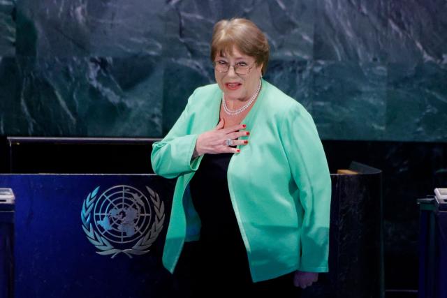 Chile's former president and candidate for the United Nations Secretary-General position Michelle Bachelet arrives to the stage to participate in a debate at the UN General Assembly Hall in New York, on July 23, 2026. Chile’s former president Michelle Bachelet, Senegal’s former president Macky Sall, Costa Rican economist and Secretary-General of UNCTAD Rebeca Grynspan, Argentine diplomat and Director General of the International Atomic Energy Agency (IAEA) Rafael Mariano Grossi, Ecuadorean diplomat and former President of the UN General Assembly Maria Fernanda Espinosa, and Guyana’s former foreign minister Carolyn Rodrigues are vying to become the next UN Secretary-General. (Photo by Leonardo MUNOZ / AFP)