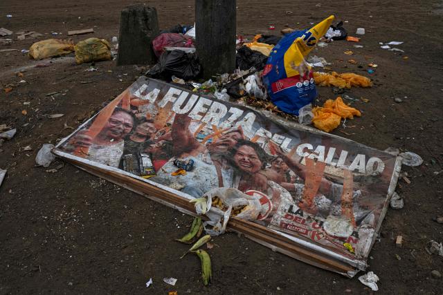 A banner with political propaganda of Peru's president-elect Keiko Fujimori, is seen on the floor next to trash at the Keiko Fujimori First Stage settlement in the Ventanilla district of the Constitutional Province of Callao, Peru, on July 18, 2026. Having defeated the left-wing candidate Roberto Sanchez in the second round, president-elect Keiko Fujimori is preparing to take office on July 28. In the shantytowns that bear her name, residents are hoping that her government will tackle public insecurity, boost the economy and create job opportunities. (Photo by ERNESTO BENAVIDES / AFP)