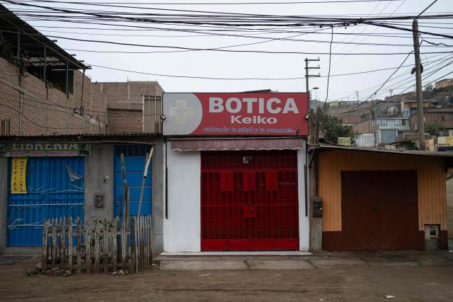View of a pharmacy named Keiko at the Keiko Fujimori Second Stage settlement in the Ventanilla district of the Constitutional Province of Callao, Peru, on July 18, 2026. Having defeated the left-wing candidate Roberto Sanchez in the second round, president-elect Keiko Fujimori is preparing to take office on July 28. In the shantytowns that bear her name, residents are hoping that her government will tackle public insecurity, boost the economy and create job opportunities. (Photo by ERNESTO BENAVIDES / AFP)
