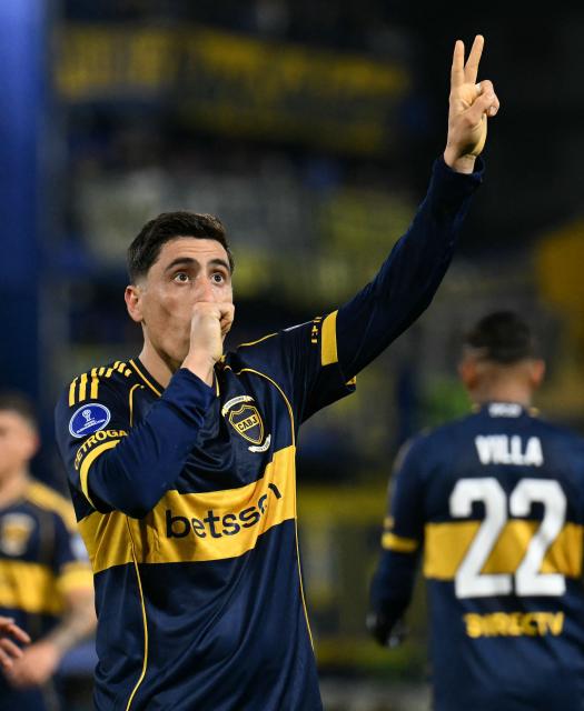 Boca Juniors' Uruguayan forward #16 Miguel Merentiel celebrates scoring his team's first goal during the first leg of the Copa Sudamericana knockout round play-off football match between Argentina's Boca Juniors and Chile's O'Higgins at La Bombonera stadium, in Buenos Aires, on July 23, 2026. (Photo by Luis ROBAYO / AFP)