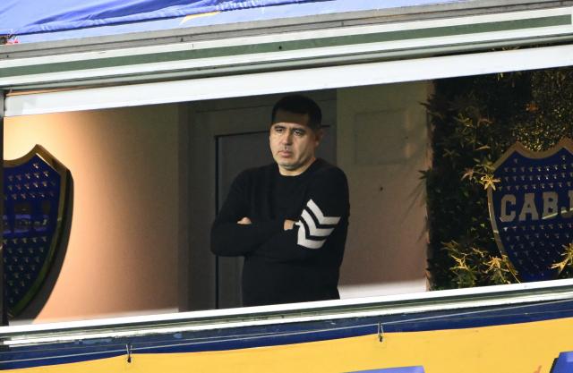 Boca Juniors' president Juan Roman Riquelme watches the first leg of the Copa Sudamericana knockout round play-off football match between Argentina's Boca Juniors and Chile's O'Higgins at La Bombonera stadium, in Buenos Aires, on July 23, 2026. (Photo by Luis ROBAYO / AFP)