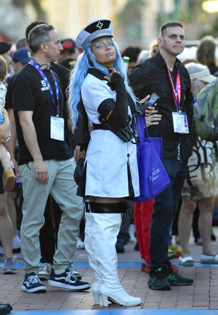 Cosplayers walk outside the Convention Center during Comic Con International in San Diego on July 23, 2026. (Photo by Chris DELMAS / AFP)