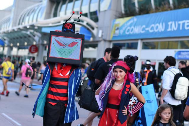 Cosplayers walk outside the Convention Center during Comic Con International in San Diego on July 23, 2026. (Photo by Chris DELMAS / AFP)