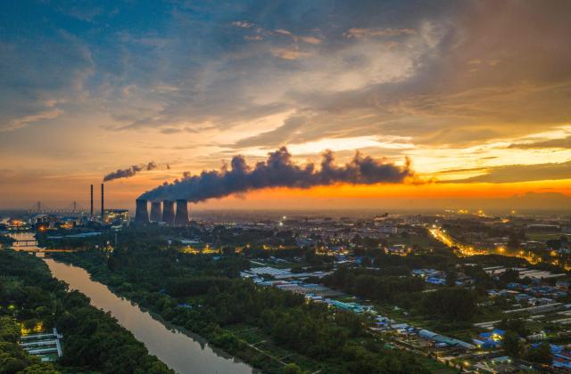 A general view photo shows the Huaneng coal-fired power plant in Huai'an, eastern China's Jiangsu province on July 23, 2026. (Photo by CN-STR / AFP) / China OUT