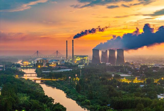 A general view photo shows the Huaneng coal-fired power plant in Huai'an, eastern China's Jiangsu province on July 23, 2026. (Photo by CN-STR / AFP) / China OUT