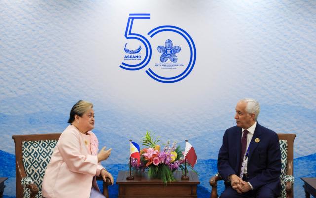 Philippines Foreign Secretary Theresa Lazaro and Qatari Minister of State for Foreign Affairs Sultan bin Saad Al-Muraikhi talk during their bilateral meeting on the sidelines of the Association of Southeast Asian Nations (ASEAN) Foreign Ministers' Meeting in Pasay, Metro Manila on July 24, 2026. (Photo by Eloisa Lopez / POOL / AFP)