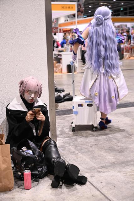Participants in cosplay outfits attend the annual Ani-Com and Games exhibition at the Hong Kong Convention and Exhibition Centre in Hong Kong on July 25, 2025. (Photo by Peter PARKS / AFP)