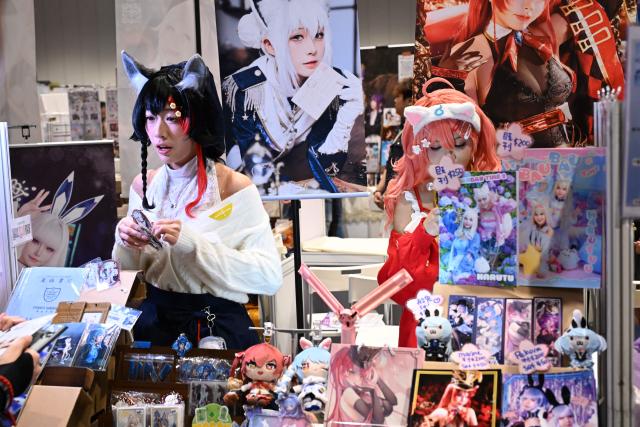 Participants in cosplay outfits attend the annual Ani-Com and Games exhibition at the Hong Kong Convention and Exhibition Centre in Hong Kong on July 25, 2025. (Photo by Peter PARKS / AFP)