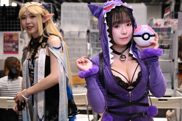 Participants in cosplay outfits attend the annual Ani-Com and Games exhibition at the Hong Kong Convention and Exhibition Centre in Hong Kong on July 25, 2025. (Photo by Peter PARKS / AFP)