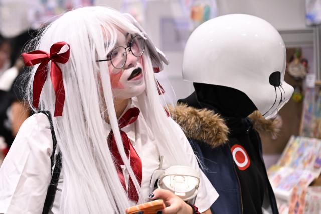 Participants in cosplay outfits attend the annual Ani-Com and Games exhibition at the Hong Kong Convention and Exhibition Centre in Hong Kong on July 25, 2025. (Photo by Peter PARKS / AFP)