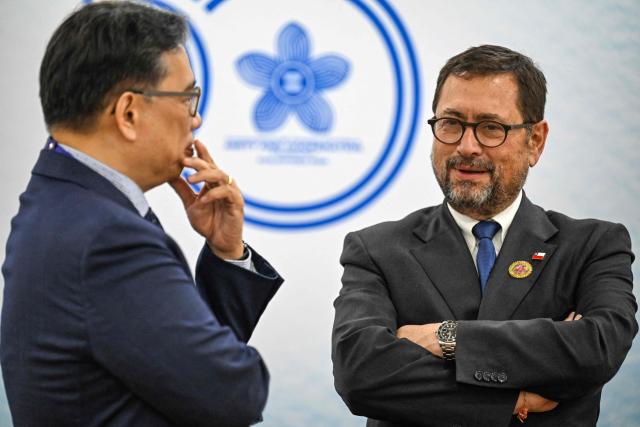 Chile Foreign Affairs Minister Francisco Perez Mackenna (R) attends a bilateral meeting with Philippine Foreign Affairs Secretary Theresa Lazaro (not pictured) on the sidelines of the Association of Southeast Asian Nations (ASEAN) foreign ministers' meetings in Pasay City, Metro Manila on July 24, 2026. (Photo by Jam STA ROSA / POOL / AFP)
