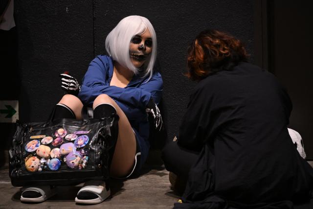 Participants in cosplay outfits attend the annual Ani-Com and Games exhibition at the Hong Kong Convention and Exhibition Centre in Hong Kong on July 25, 2025. (Photo by Peter PARKS / AFP)