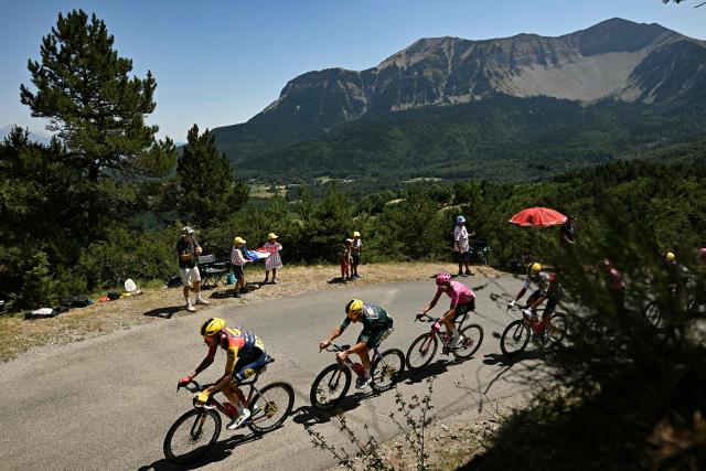 Lidl - Trek team's Canadian rider Derek Gee-West (L) and Lidl - Trek team's Danish rider Mads Pedersen wearing the sprinter's green jersey cycle during the 19th stage of the 113th edition of the Tour de France cycling race, 127,9 km between Gap and Alpe d'Huez in the French Alps, on July 24, 2026. (Photo by Loic VENANCE / AFP)
