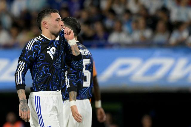 (FILES) Argentina's defender #19 Nicolas Otamendi celebrates after scoring his team's third goal from the penalty spot during a friendly football match between Argentina and Zambia at La Bombonera stadium in Buenos Aires on March 31, 2026. Veteran centre-back Nicolas Otamendi announced his retirement from the Argentina national team on July 23, 2026, four days after their 1-0 defeat to Spain in extra time in the 2026 World Cup final. (Photo by JUAN MABROMATA / AFP)