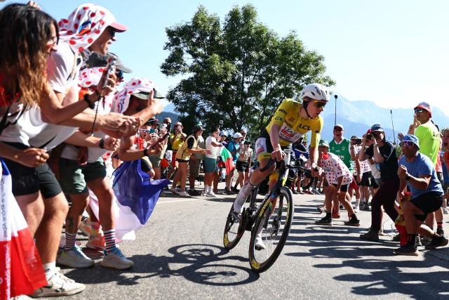 UAE Team Emirates - XRG's Slovenian rider Tadej Pogacar wearing the overall leader's yellow jersey chases down the lead breakaway in the Alpe d'Huez ascent during the 19th stage of the 113th edition of the Tour de France cycling race, 127,9 km between Gap and Alpe d'Huez in the French Alps, on July 24, 2026. (Photo by Anne-Christine POUJOULAT / AFP)
