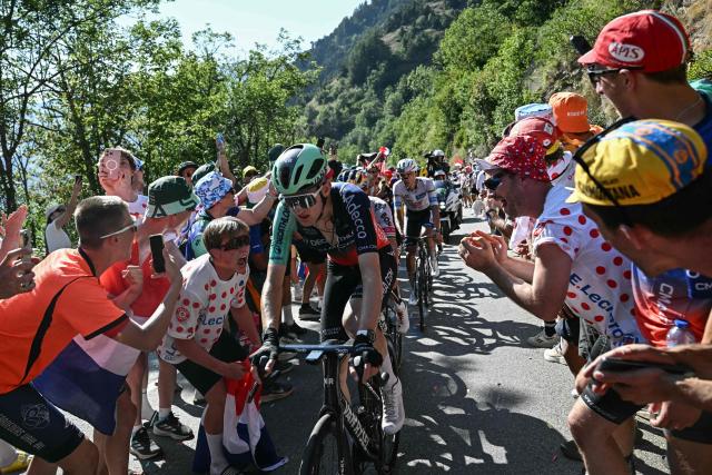 Decathlon CMA CGM Team's French rider Paul Seixas cycles in the Alpe d'Huez ascent during the 19th stage of the 113th edition of the Tour de France cycling race, 127,9 km between Gap and Alpe d'Huez in the French Alps, on July 24, 2026. (Photo by Loic VENANCE / AFP)